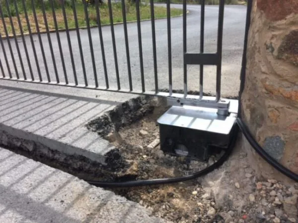 Motores para puertas abatibles de garaje de tipo enterrado